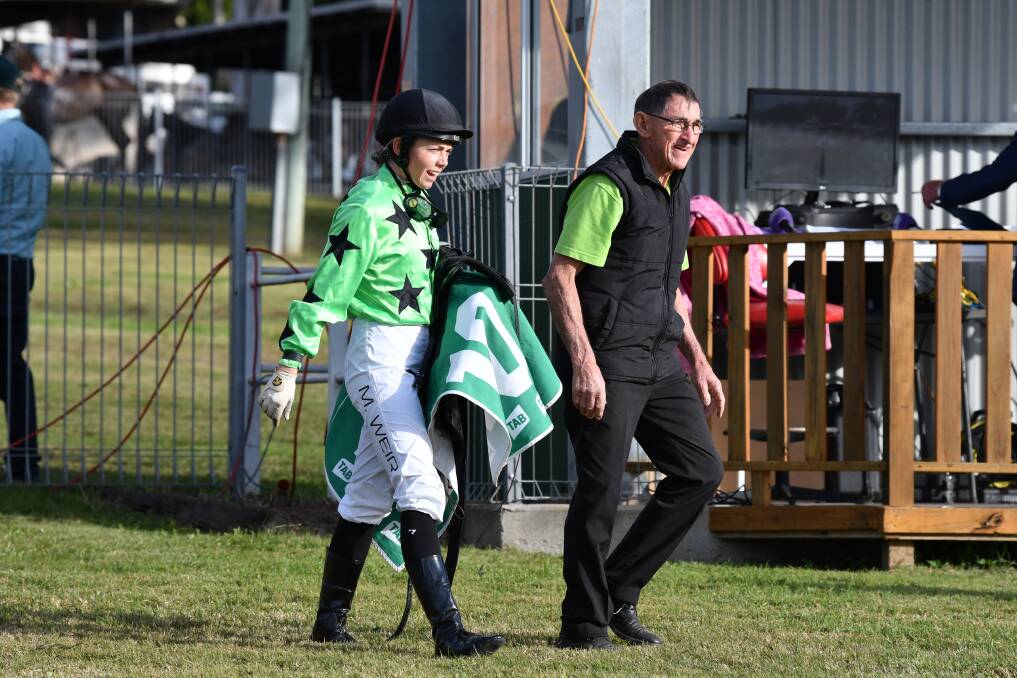 Mikayla Weir with Kempsey trainer Roy Franklin at the Wauchope Cup carnival in Kempsey last weekend. Photo: File 