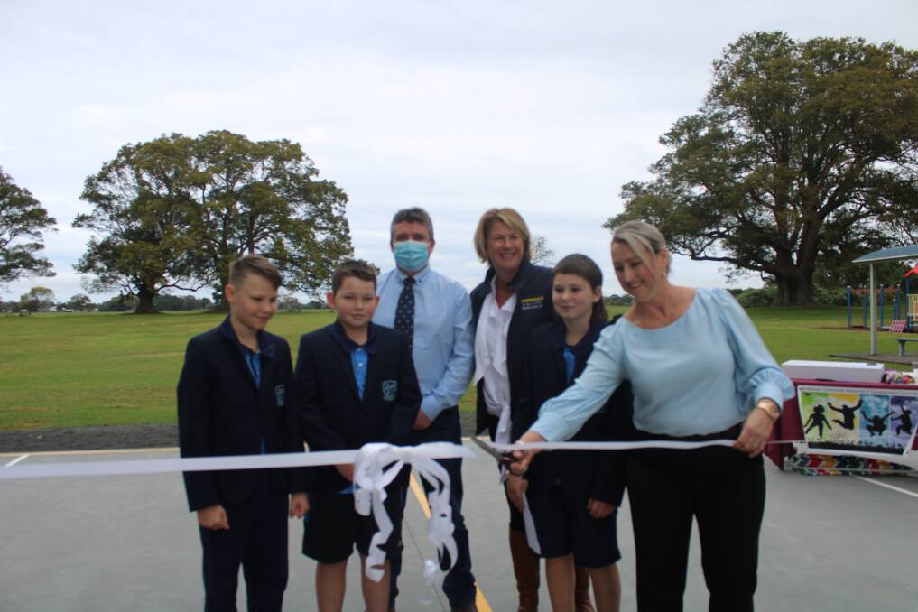 Allyson Hickson cuts the ribbon to officially open the Smithtown multi-purpose Basketball Court. Photo: Lachlan Harper