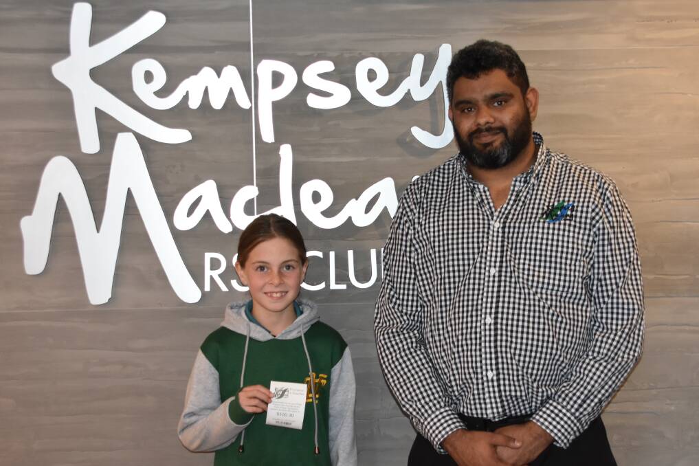 Amelia Wilson with Corey from Kempsey Macleay RSL Club. Photo: Lachlan Harper 