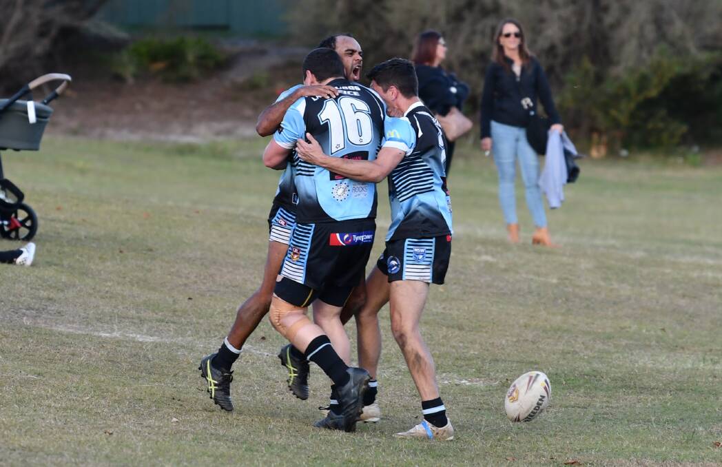 Malcolm Webster celebrates his chip and chase try. Photo: Penny Tamblyn 