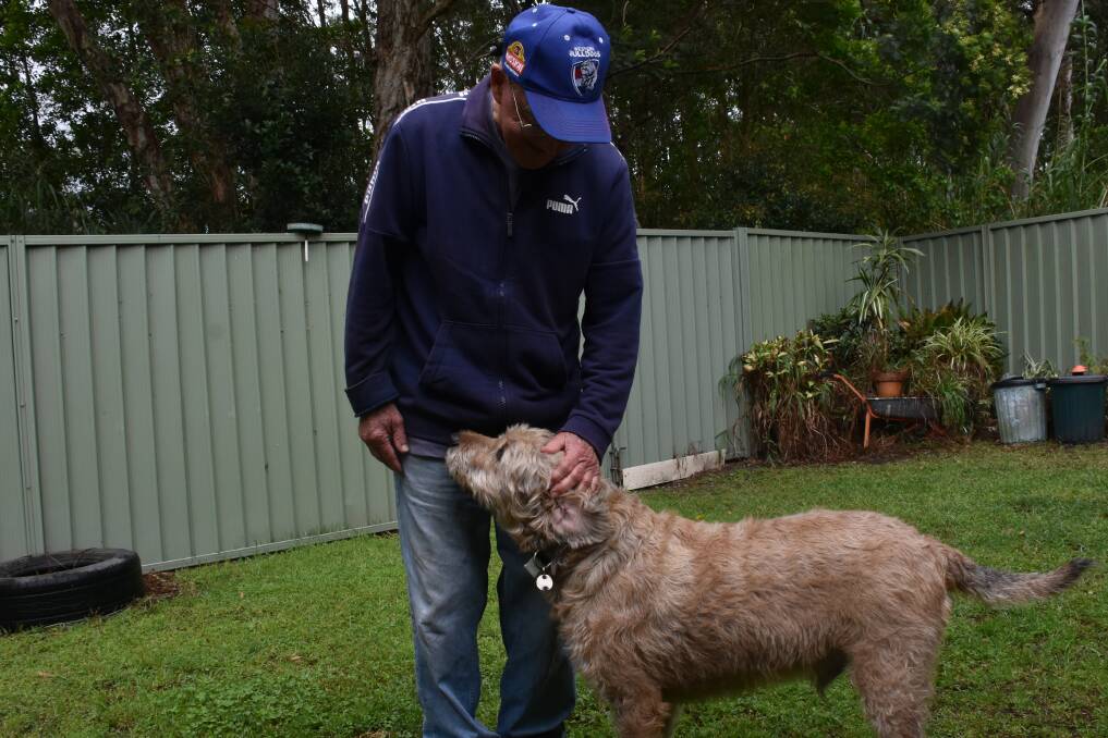 Kevin with his dog Longreach. Photo: Lachlan Harper 