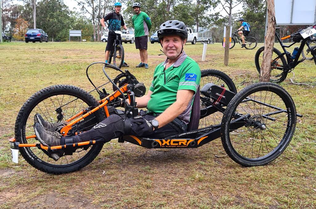 Glen Clark with his adaptive cycle. Photo: Penny Tamblyn 