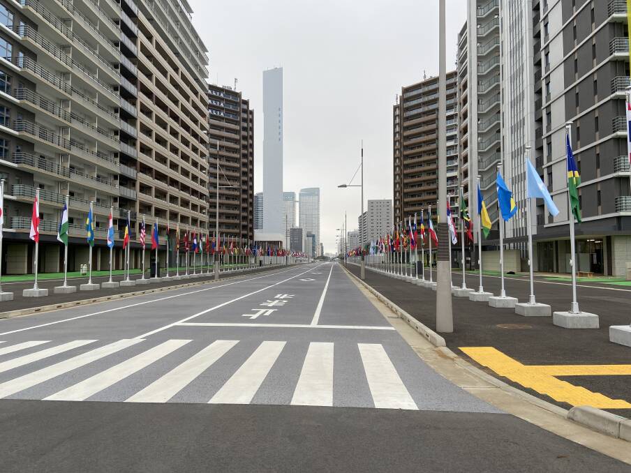 Tokyo street lined with various countries flags. Photo: Supplied 