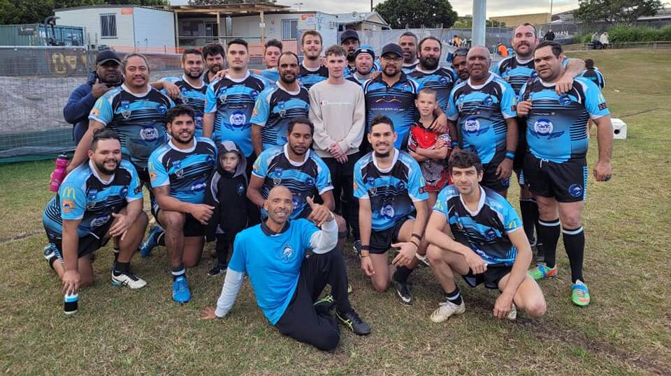 Mason Powick with his Marlins family. Photo: South West Rocks Marlins Rugby League Football Club Facebook. 