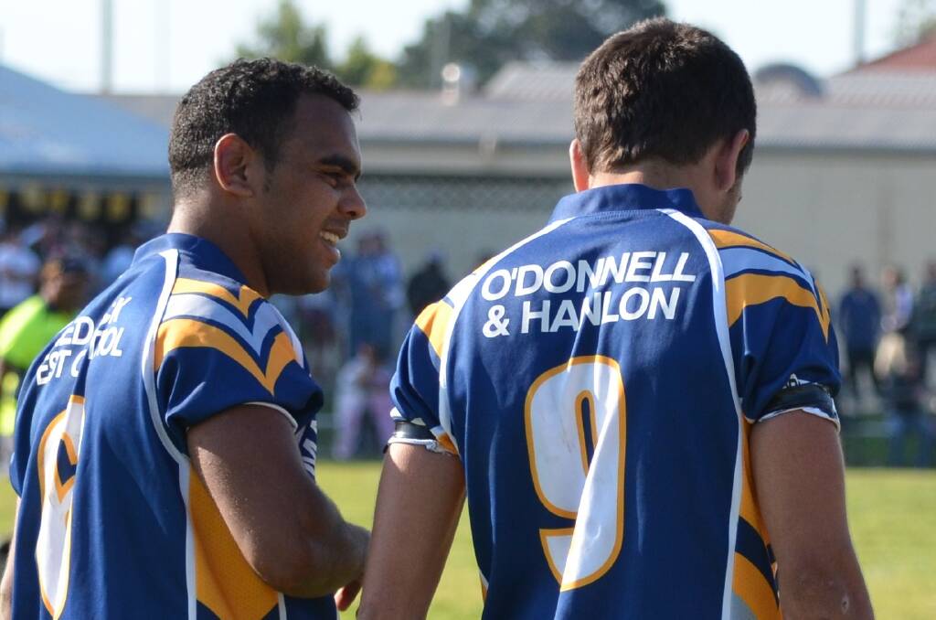 Mal Webster and Anthony Cowan during the 2012 grand final. Photo: Penny Tamblyn 