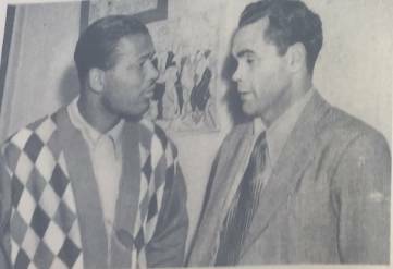 Dave Sands converses with one of the greatest boxers of all time, Sugar Ray Robinson. Photo: Supplied