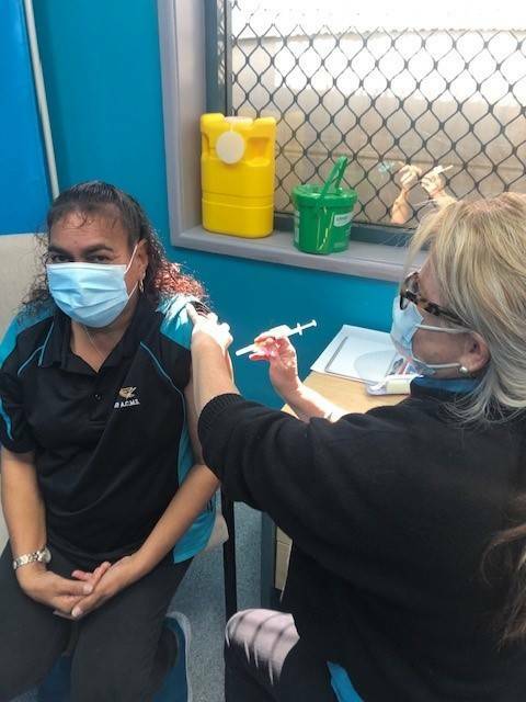  Tracey Bradshaw being vaccinated by Kimmy Wright. Photo: Supplied 