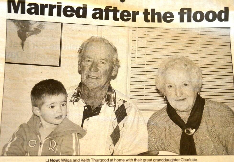 An article in The Argus on the wedding anniversary of Keith and Wilga. This photo features Keith, Wilga and their great granddaughter Charlotte.