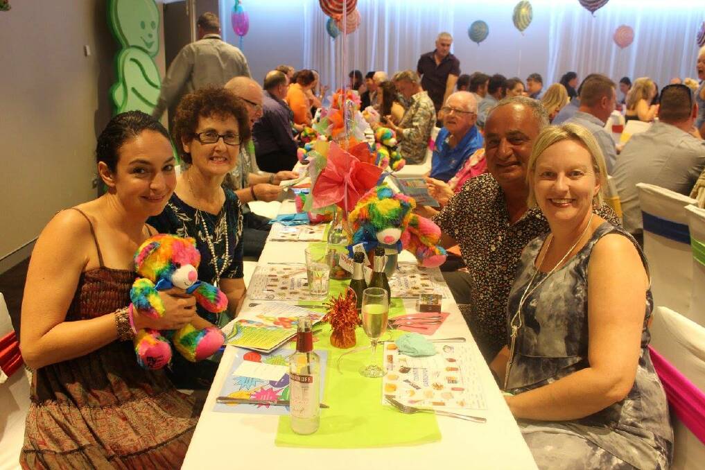SUPPORTING LOCAL KIDS: Guests received goodies such as rainbow teddy bears and lollipops to symbolize the event's support for local kids.