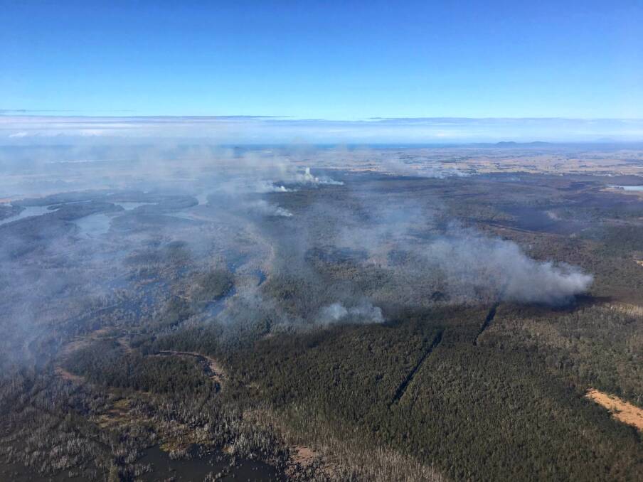 Aerial view of the Clybucca fire. The fire eased later in the week but will continue to burn for several weeks. Photo: NSW Rural Fire Service