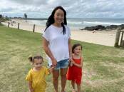 Port Macquarie Doctor Lisa An with her daughters Hazel and Rosie. Dr An has received her booster and is urging others to do the same. 