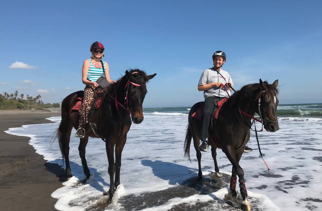 Ellie and Brett enjoyed horse riding in Bali. Photo: supplied. 