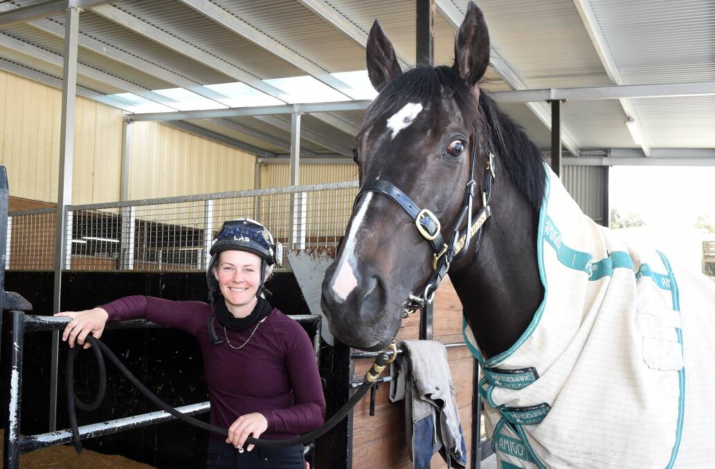 ALL SET: Trackrider Nikki White with Melbourne Cup runner Persan at the Ballarat stable of Ciaron Maher and David Eustace. Picture: Kate Healy