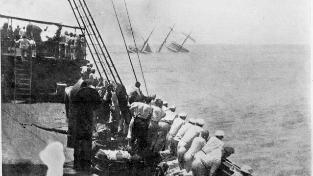 Crew of the German Raider Wolf watching as the French barque Marechal Davout sinks off the coast of Trinidad (Australian War Memorial).
