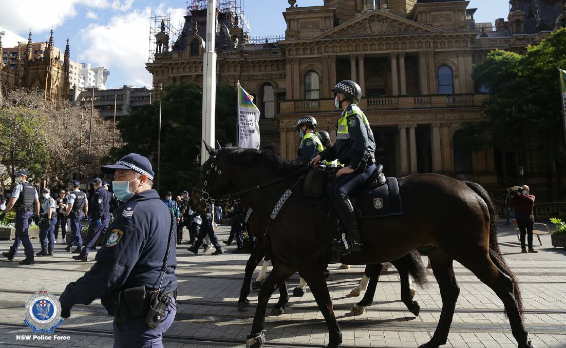Police on patrol during an unauthorised protest in Sydney's CBD. Photo: NSW Police