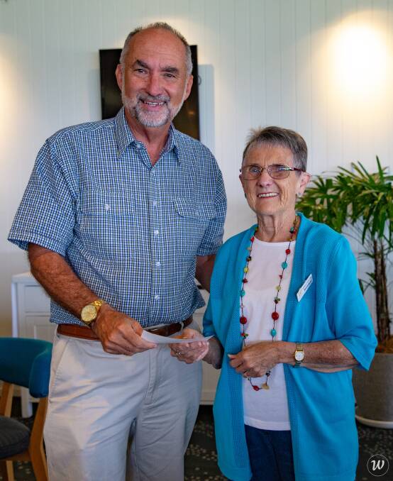 Donation: Mark Youngblutt, President of Lions with Anne Gaffney, President of the Westport Travel Club. Photo: Supplied 