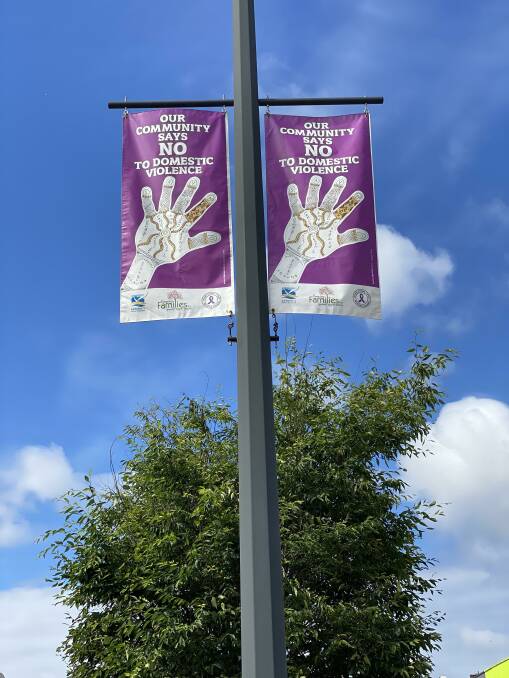 Smith St banners supplied by Kempsey Families which display the artwork of two students from local Kempsey High Schools created through the Love Bites Healthy Relationships in Schools Program
