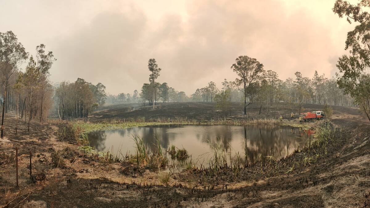 An RFS truck filling at the dam during the Black Summer bushfires. CREDIT: Rebecca Papalii.