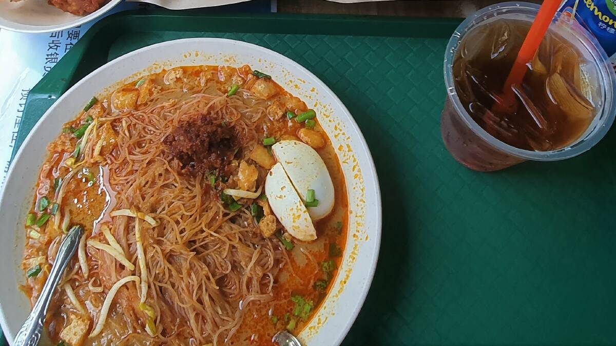 Street food is well priced and high quality in Singapore, such as this Mee Siam.