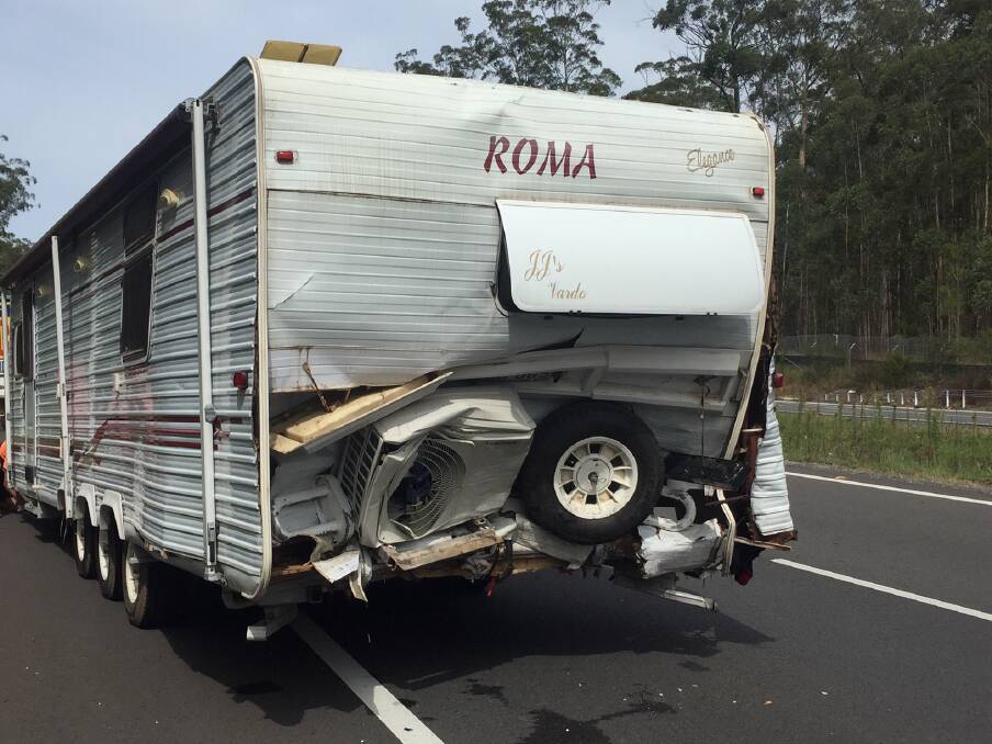 Crash: A damaged caravan after a traffic accident on Pacific Hwy. Photo: Port Macquarie Police.