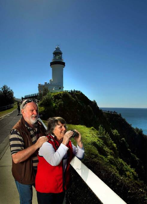 Watching the whales: Dr Wally and Dr Trish Franklin watching migration. Photo: Supplied.