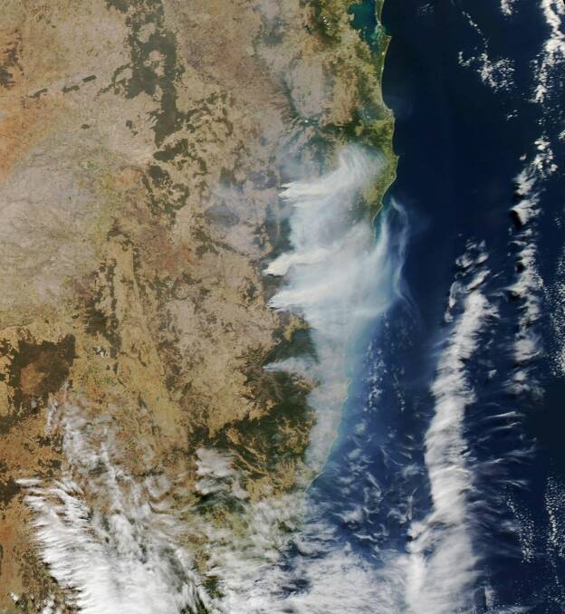 BURNING LAND: A satellite image taken on Thursday, September 12 of bush fires burning across the North Coast. Photo: NSW Rural Fire Service Mid Coast District
