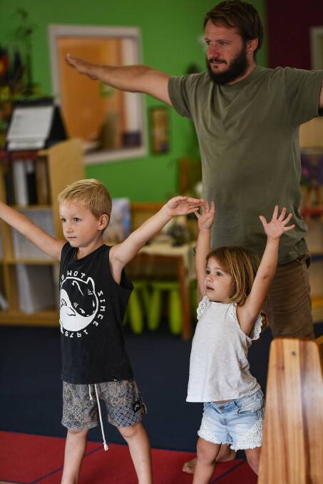 Lower Macleay Preschool family Benji, Maya and Dion Browne exercising together as part of the “Exercise is Fun with my Family” project. Photo: Supplied