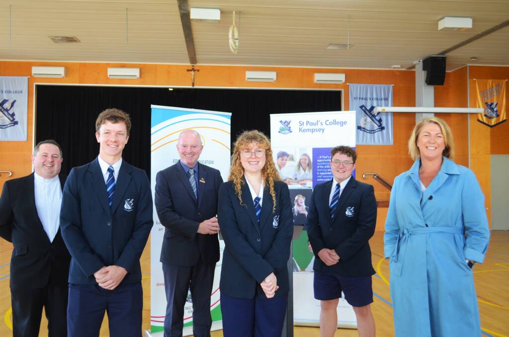 Father James Foster, College Leader Corey Crotty, Principal Kevin Lewis, College Leaders Abby Livermore and Ron Mavin and Member for Oxley Melinda Pavey. Photo: Ruby Pascoe