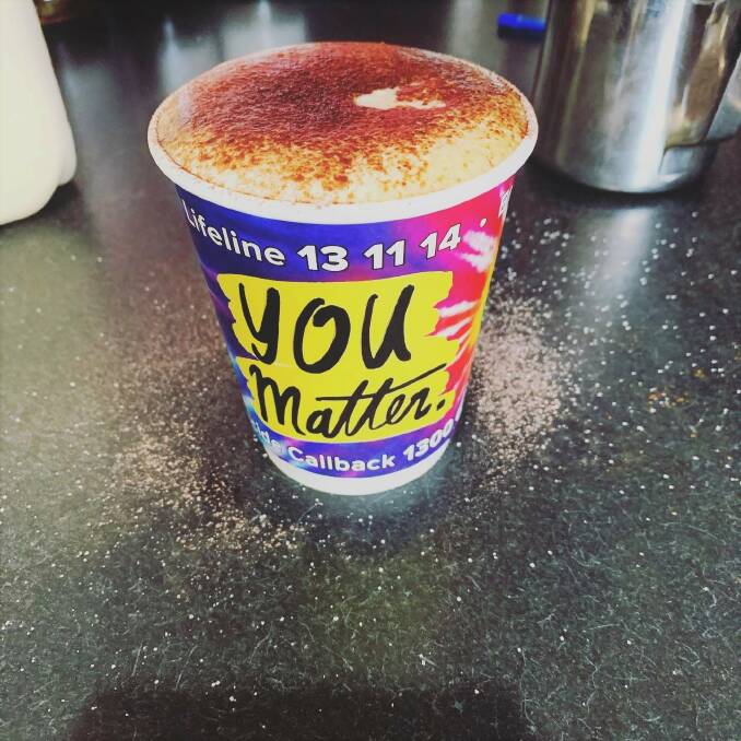 The colourful cups can be found at a number of cafe's throughout the Macleay. Photo: Supplied