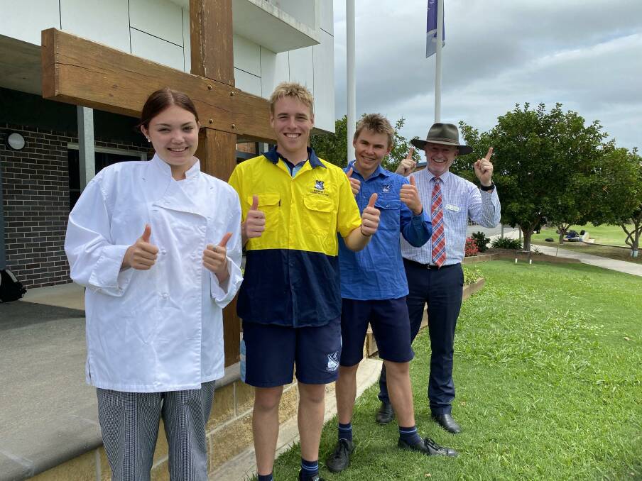 St Paul's College VET students, Charlie Brown (Hospitality), Lachlan Dowling (Construction) and Flynn McGoldrick (Primary Industries) with Principal Kevin Lewis. Photo: Supplied