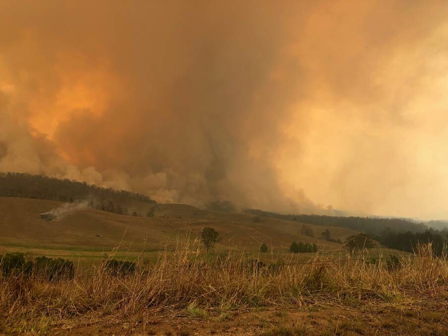 Photo of the fire activity at Taylors Arm Road. Photo: NSW RFS Lower North Coast Team