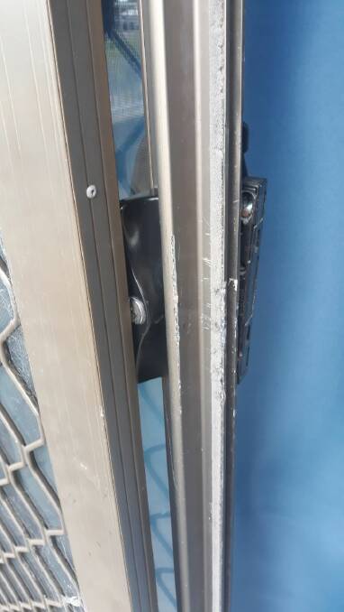 The damaged door of the Kempsey Show Society office. Photo: Supplied
