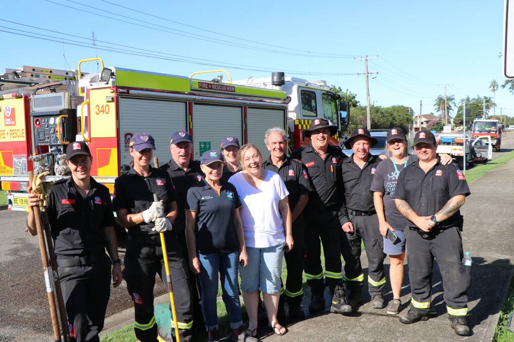 The mayor with community members and the Fire and Rescue team at Smithtown Public School