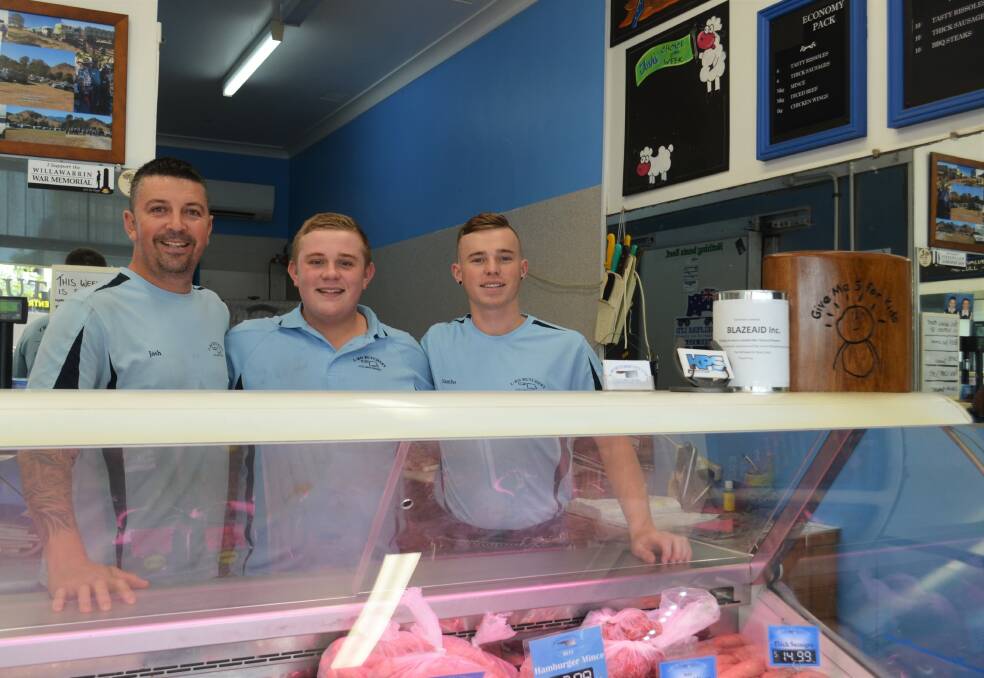Josh Ball, Charlie Supple and Sam Thompson have been working around the clock to keep up supplies for locals at L-Bo Butchery. Photo: Ruby Pascoe