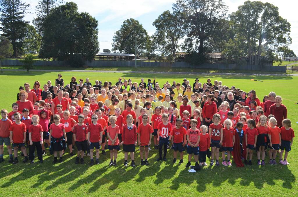 Students creating the flag in celebration of Naidoc Week. Photo: Ruby Pascoe