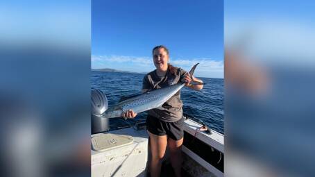 Tara Rowe with a spotted mackerel she caught this week in Plomer Bay. Picture, supplied