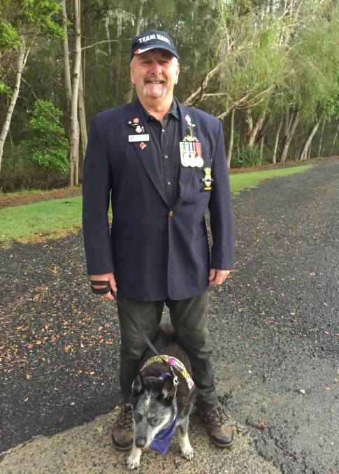Former RAN Submariner Tex O'Grady and his dog Bundy - The force behind Two Dogs Sailing program. Photo: Coffs Coast Legacy