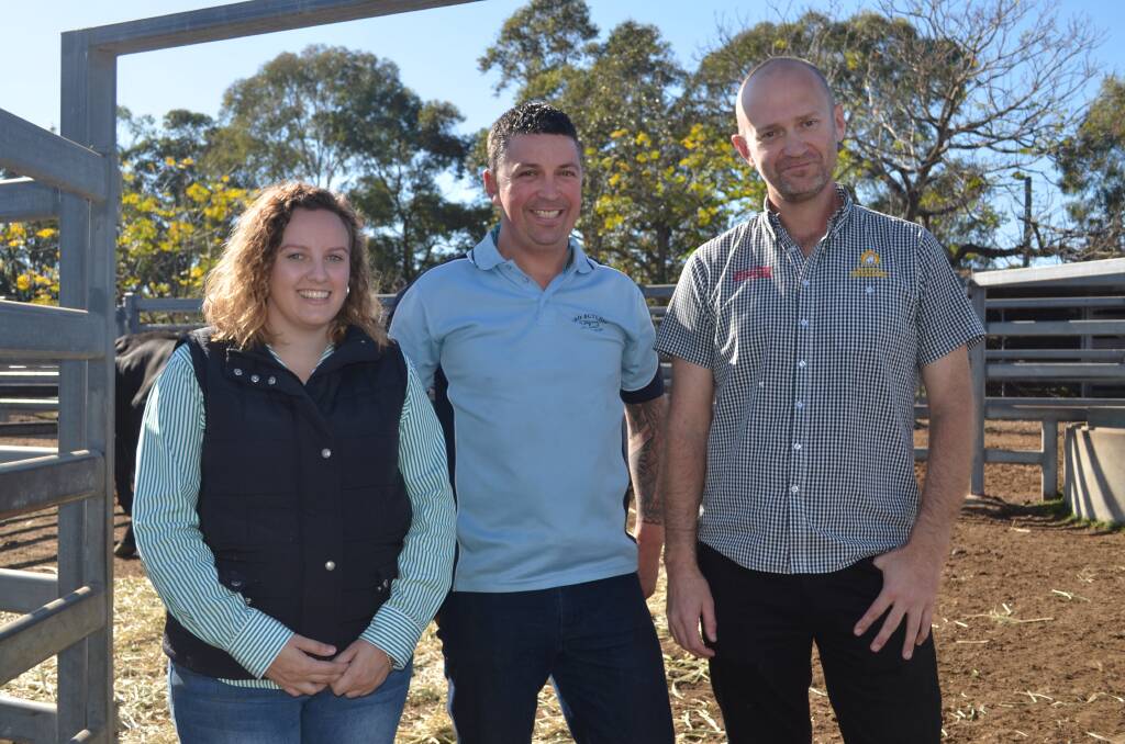 Lending a hand: Samantha Hughes from Kempsey Stock & Land, owner of L-Bo Butchery Josh Ball and owner of the West Kempsey Hotel Tim Smith. Photo: Ruby Pascoe