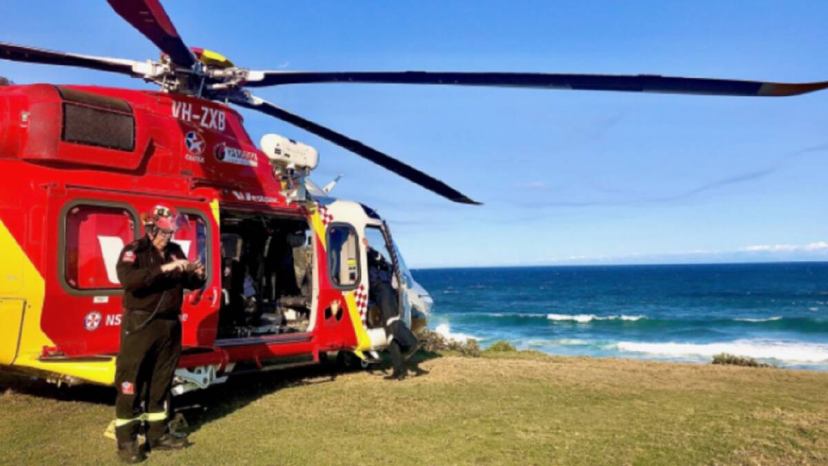 Two people rescued after being swept around headland at Hat Head