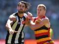 The Demons have reportedly held talks with injured Collingwood ruckman Brodie Grundy (l). (James Ross/AAP PHOTOS)