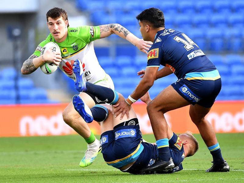 Canberra's Curtis Scott (l) will miss the NRL finals to undergo surgery on his right leg.