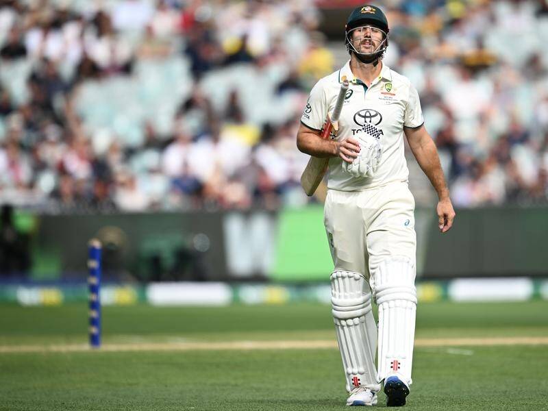 Mitch Marsh (96) trudges off the MCG after missing out on a century in the Boxing Day Test. (Joel Carrett/AAP PHOTOS)