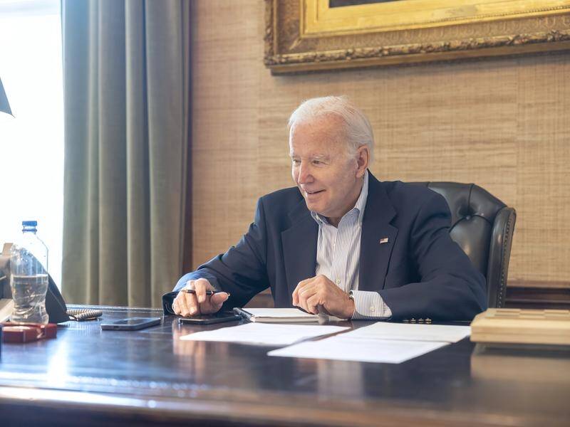 President Joe Biden says he's "getting a lot of work done" and will continue with his duties. (AP PHOTO)