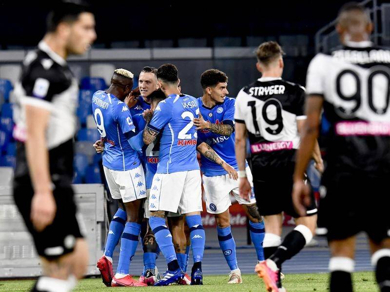 Napoli players celebrate Piotr Zielinski's goal in their Serie A rout of visitors Udinese.