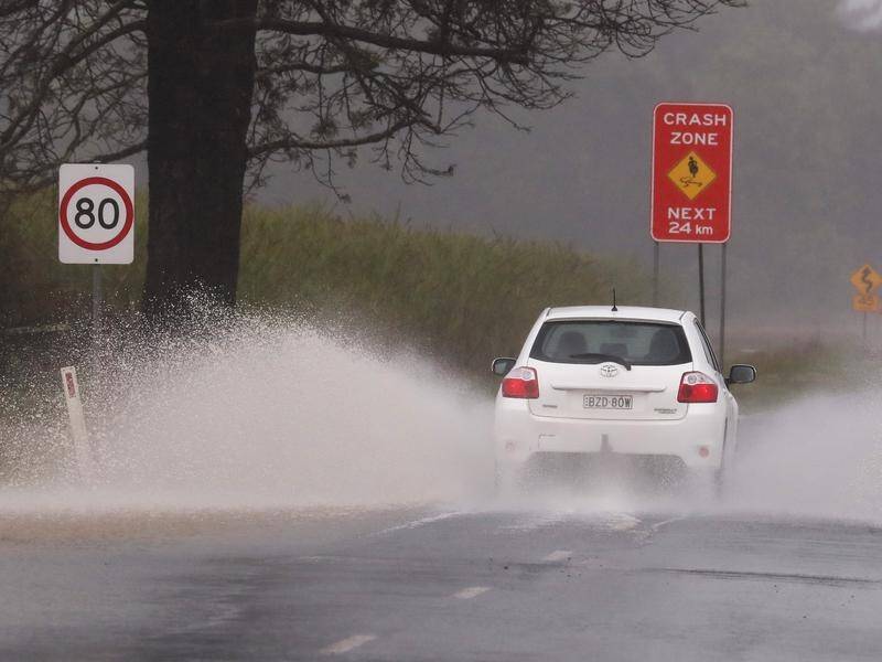 Western NSW is in for another downpour of up to 80mm across already waterlogged areas. (JASON O'BRIEN/AAP PHOTOS)