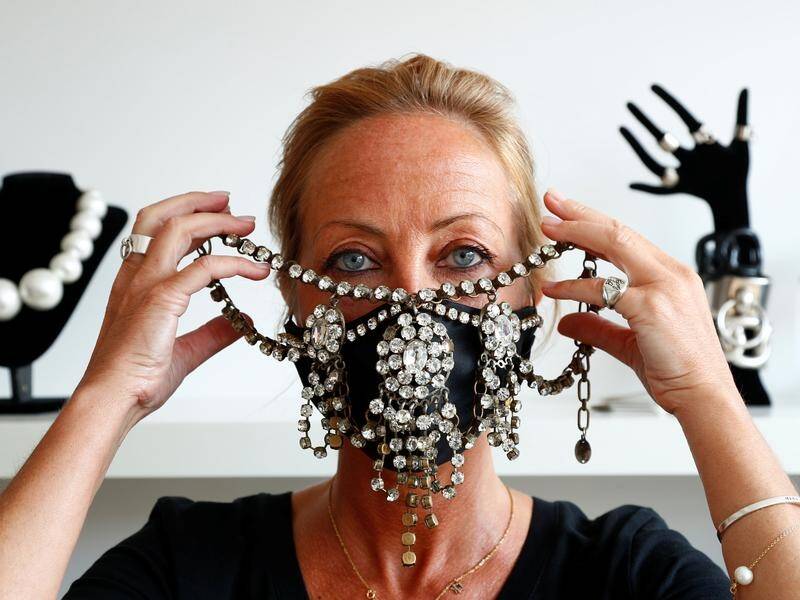 Belgian designer Olivia Hainaut has decorated masks with gems and sequins for a touch of glamour.