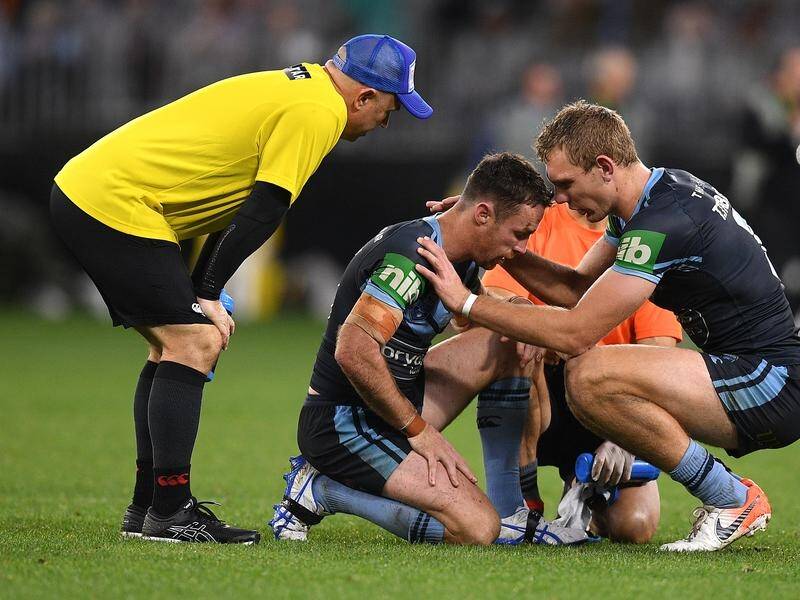 NSW No.6 James Maloney (c) was on the receiving end of some questionable tackles in Origin II.