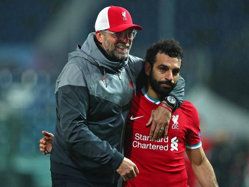 Liverpool boss Jurgen Klopp (l) has offered no public criticism of Mo Salah, saying "we are fine".