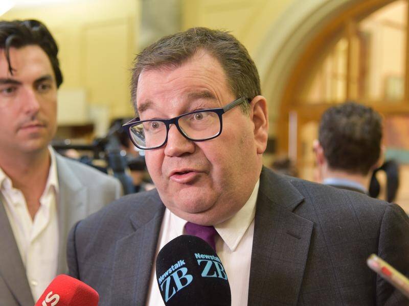 NZ Finance Minister Grant Robertson says public servants on more than $NZ100,000 are wage frozen.