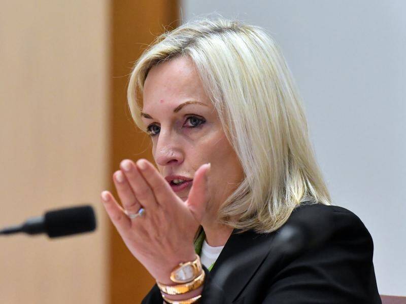 Australia Post chief Christine Holgate says she has not been told she's been stood down.